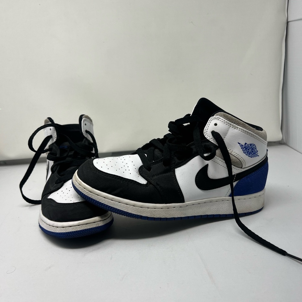 Black blue and white Jordan’s